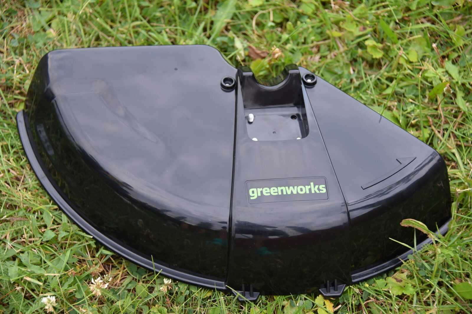 защитный кожух аккумуляторного триммера Greenworks GD40BCB